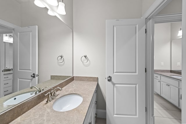 bathroom with vanity and tile patterned floors