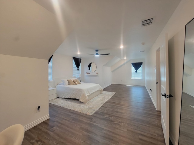 bedroom featuring ceiling fan and dark hardwood / wood-style floors