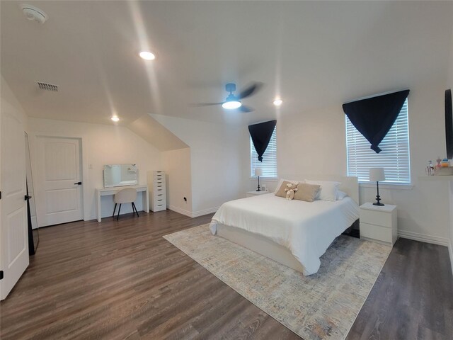 bedroom featuring dark hardwood / wood-style floors and ceiling fan