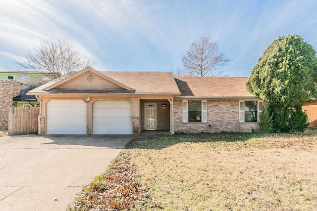 ranch-style house featuring a garage