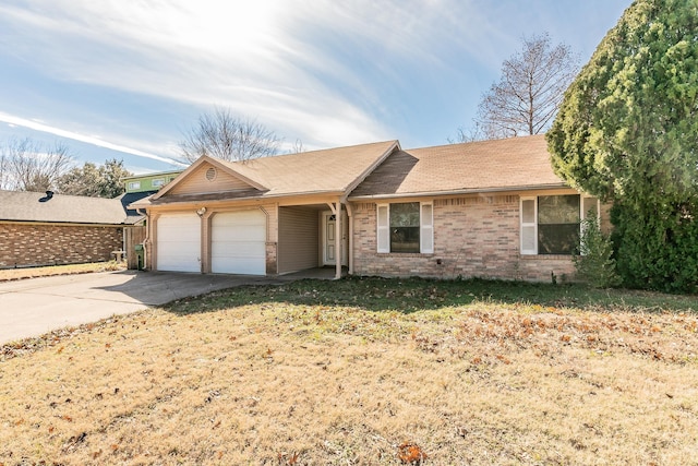 single story home with a garage and a front lawn