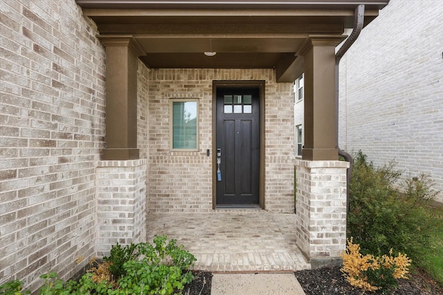 property entrance with a porch