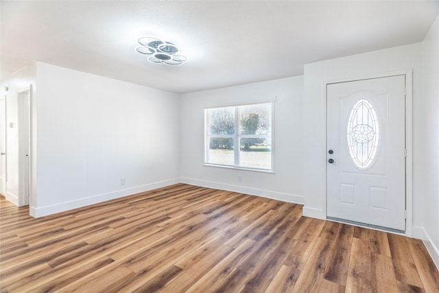 entrance foyer featuring hardwood / wood-style floors