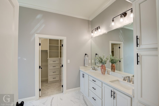 bathroom with vanity and ornamental molding