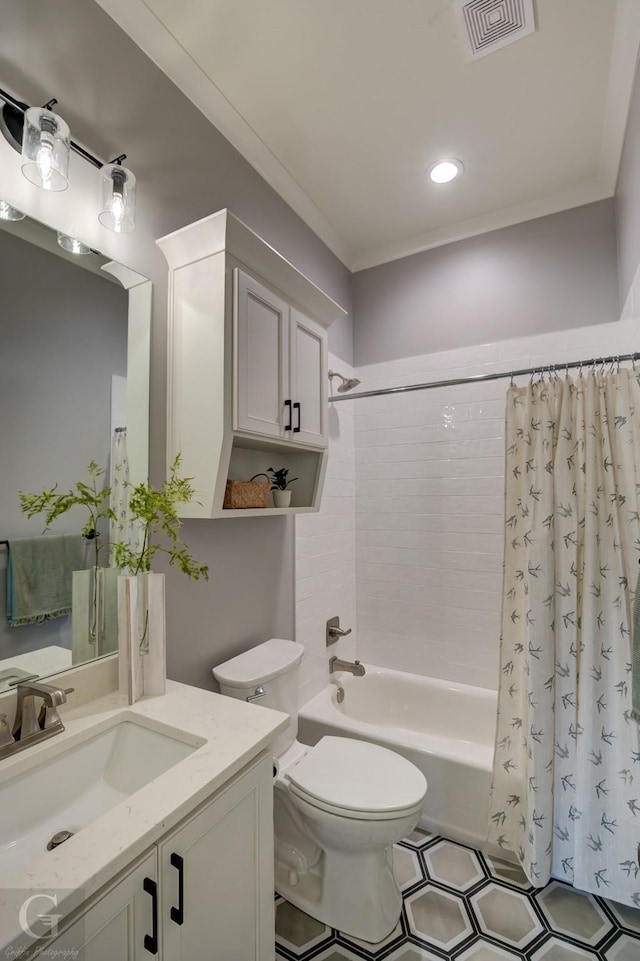 full bathroom featuring vanity, toilet, crown molding, and shower / tub combo