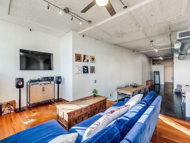 living room with hardwood / wood-style floors and ceiling fan