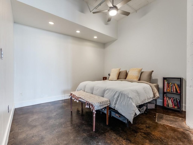 bedroom featuring a towering ceiling and ceiling fan