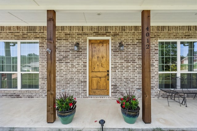 property entrance with a porch