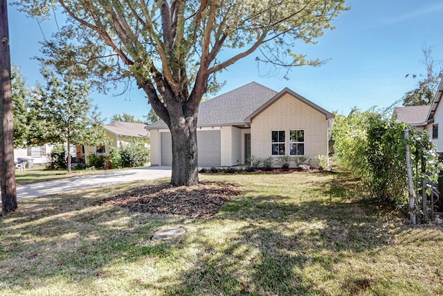 ranch-style house with a front yard and a garage