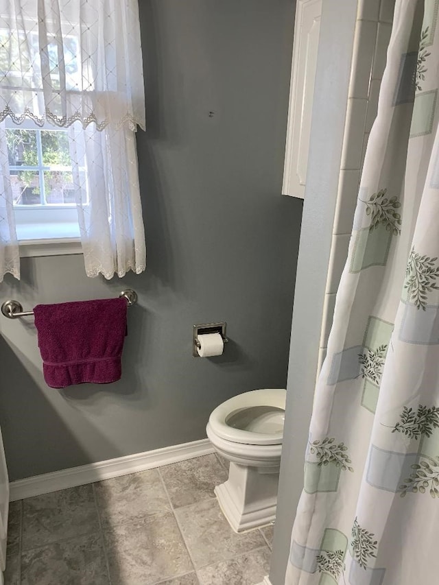 bathroom featuring toilet