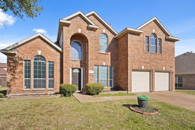 front of property featuring a garage and a front yard