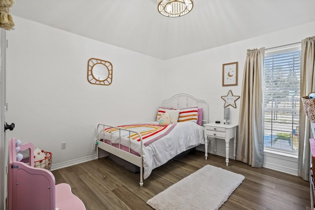 bedroom featuring dark hardwood / wood-style floors