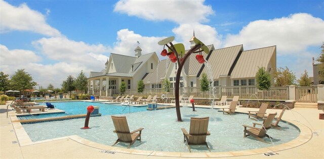 view of pool featuring pool water feature