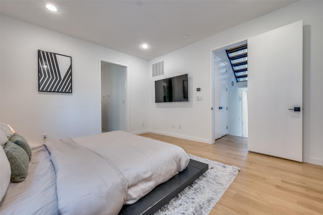 bedroom featuring light hardwood / wood-style flooring