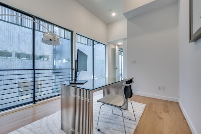 home office with light wood-type flooring