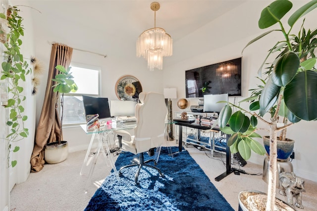 carpeted office with a notable chandelier