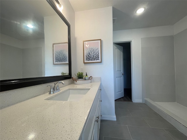 bathroom featuring vanity and tile patterned flooring