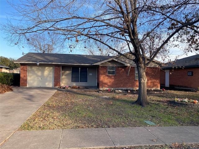 single story home featuring a garage