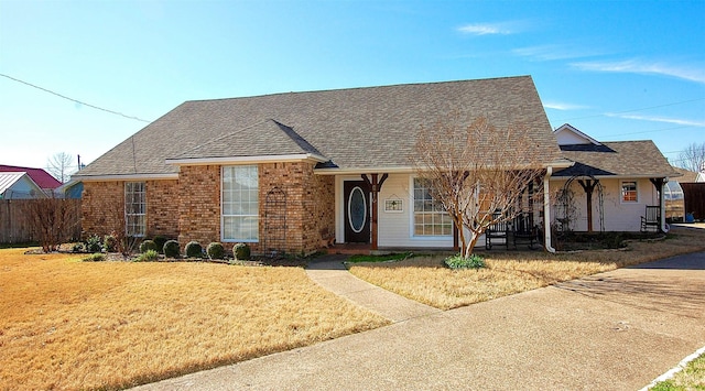 view of front of home with a front lawn