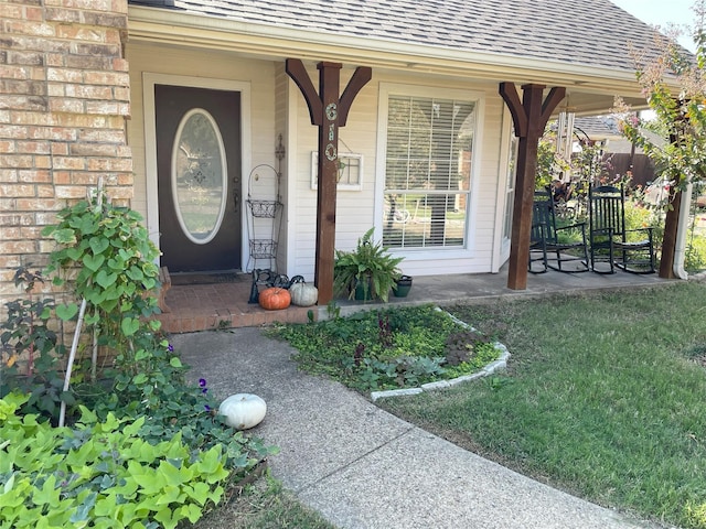 entrance to property with a porch