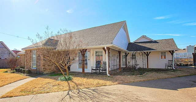 view of front of home with a front lawn