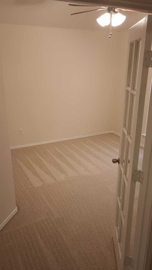 unfurnished room with carpet floors