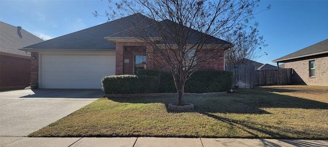 view of front of home featuring a garage and a front yard