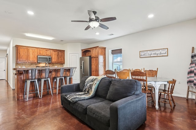 living room with ceiling fan