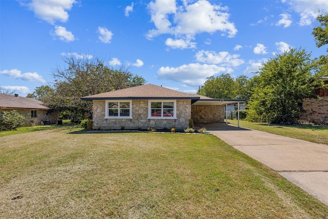 single story home featuring a front lawn and a carport