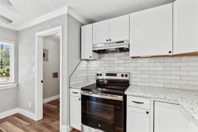 kitchen with under cabinet range hood, light wood-style flooring, stainless steel electric range, and white cabinets