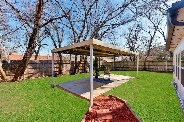 view of yard with a patio area