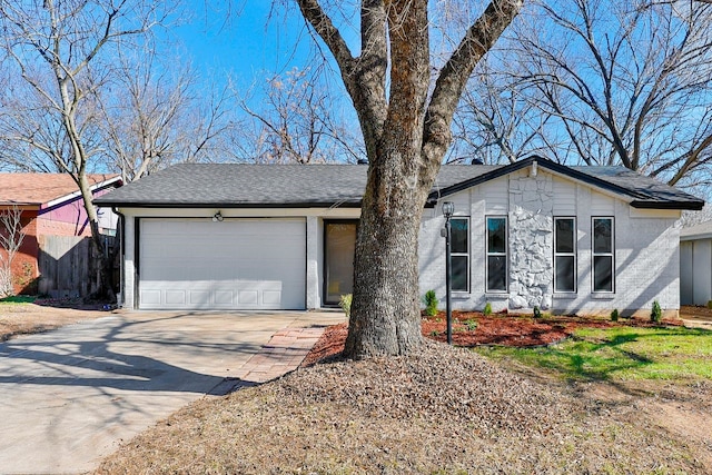 ranch-style home featuring a garage