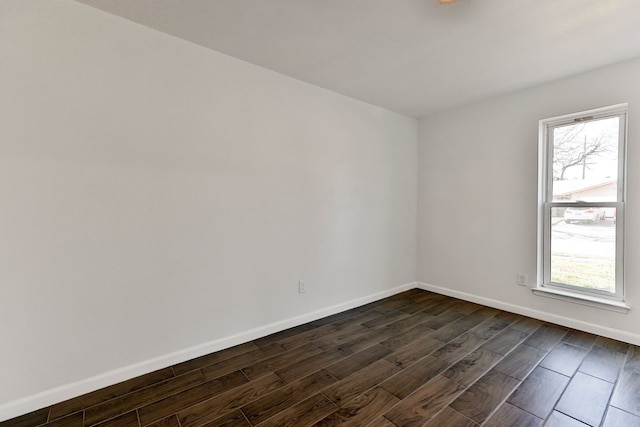 empty room featuring dark hardwood / wood-style floors