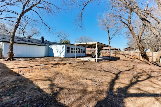 rear view of house featuring a patio