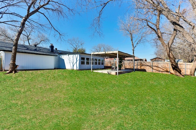 rear view of property with a patio area and a lawn