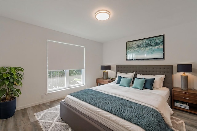 bedroom featuring hardwood / wood-style floors