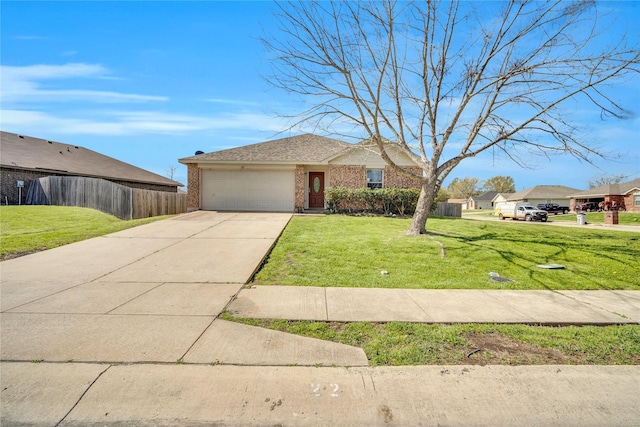 ranch-style home featuring a garage and a front yard