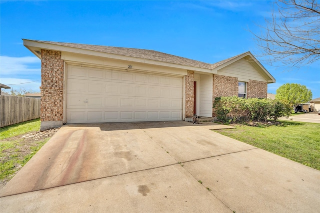 single story home with a front yard and a garage