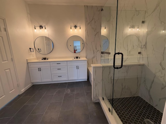 bathroom featuring vanity, tile patterned floors, and a shower with door