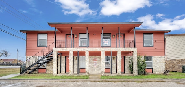 view of front of home featuring covered porch