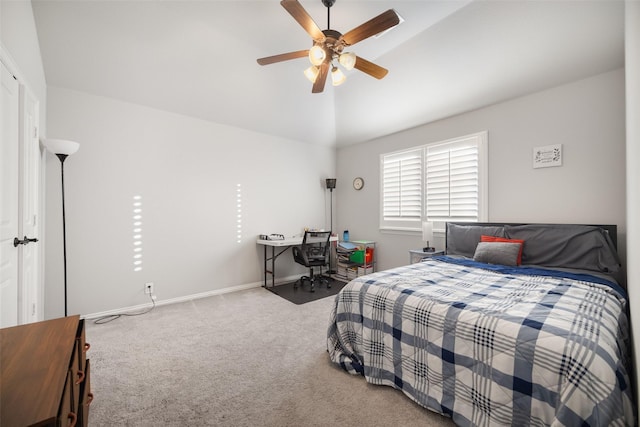 carpeted bedroom featuring ceiling fan and lofted ceiling