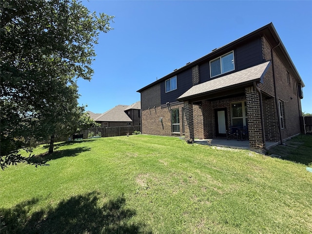 310 Hawthorn Dr, Wylie, TX 75098 - rear view of house with a patio area and brick siding