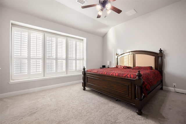 bedroom featuring light carpet, ceiling fan, and lofted ceiling