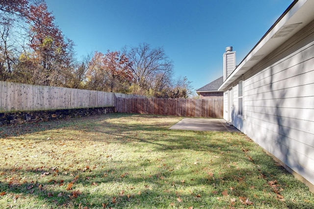 view of yard with a patio area