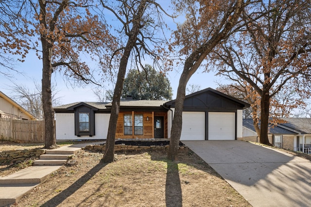 single story home featuring a garage