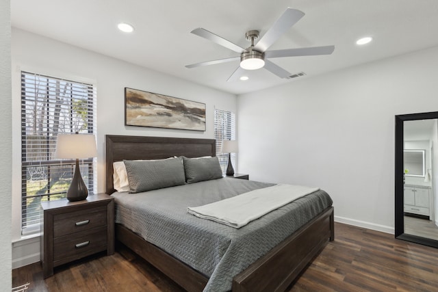 bedroom featuring ceiling fan and dark hardwood / wood-style floors