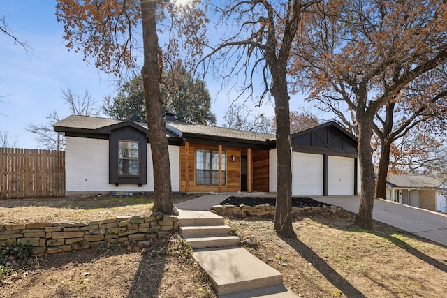 single story home with a garage