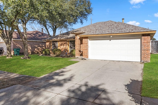 single story home with a garage and a front lawn