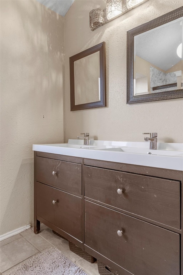 bathroom with vanity and tile patterned floors