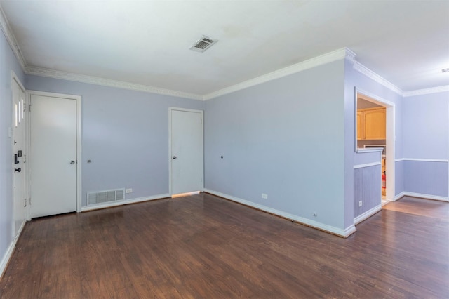 unfurnished room with crown molding and dark wood-type flooring